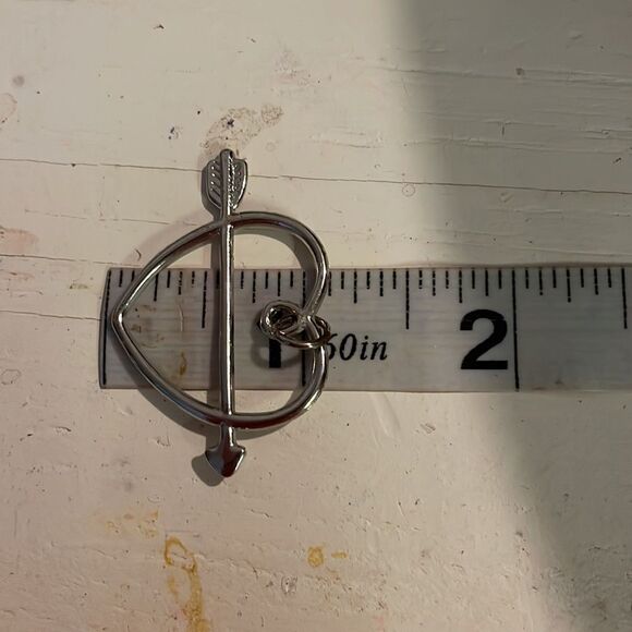 1” x 1.5” reversible silver tone open heart with arrow pendant with jump hoop - Picture 9 of 12